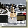 The Baggage Handler (a.k.a. Frank) amongst his suitcases in the Penticton roundabout.